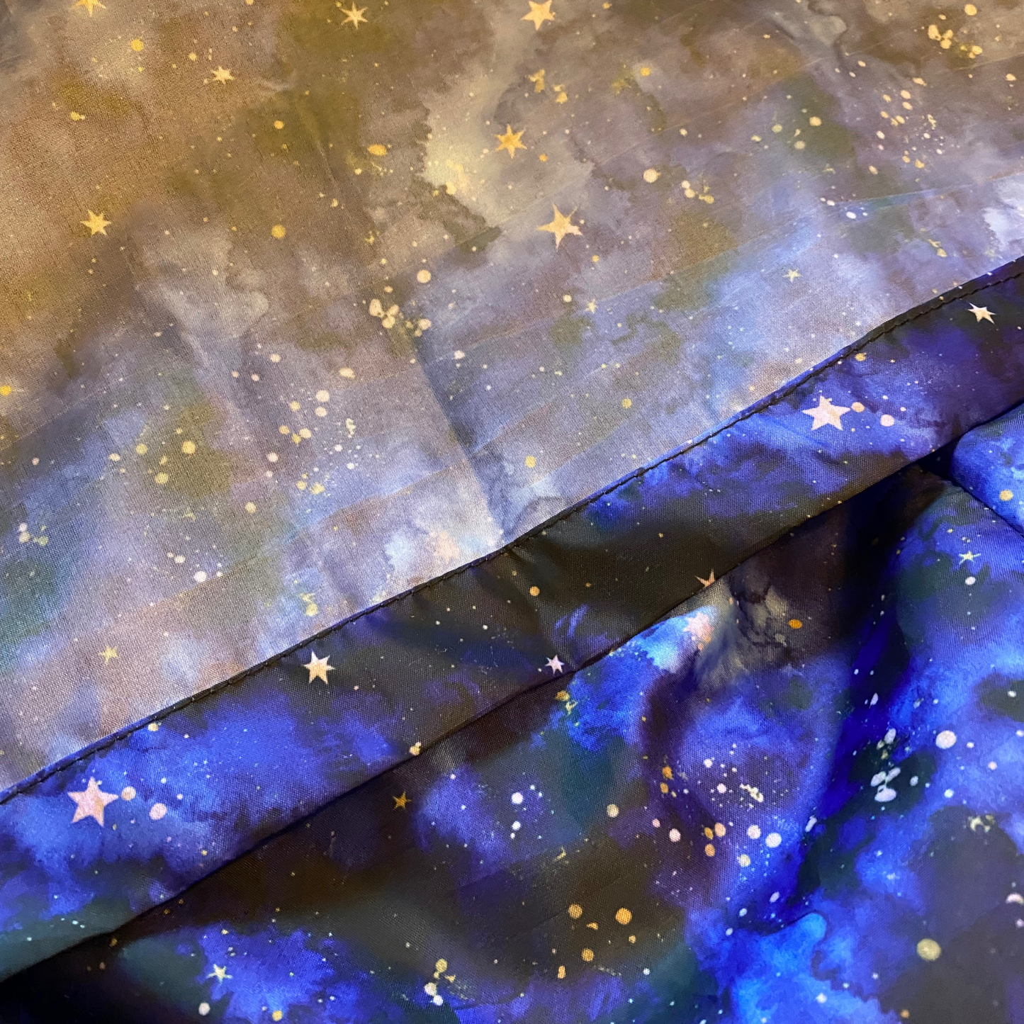 Custom midnight blue fabric with golden stars, part of the Starry Night Sensory Parachute for sensory baby play.