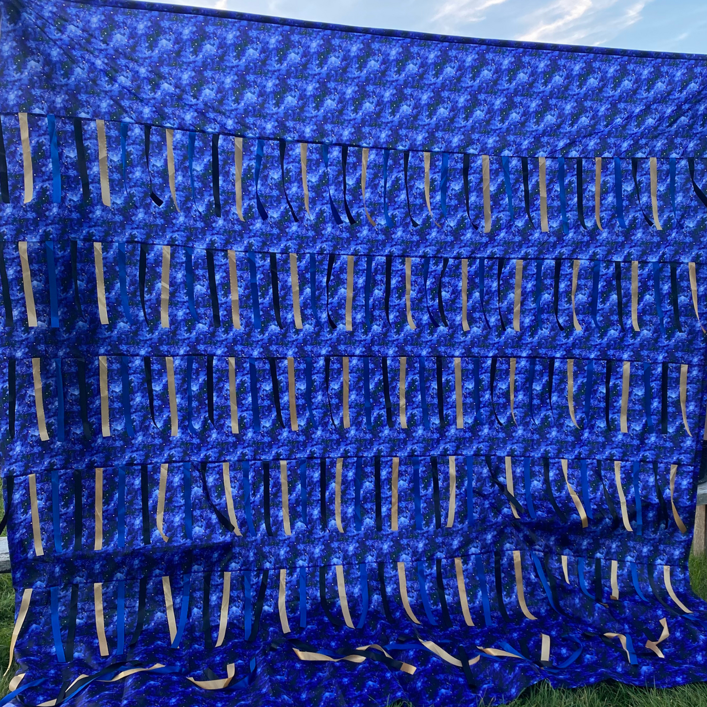 Starry Night Sensory Parachute — 3m midnight blue parachute with golden star fabric and over 200 blue and gold ribbons for baby classes.