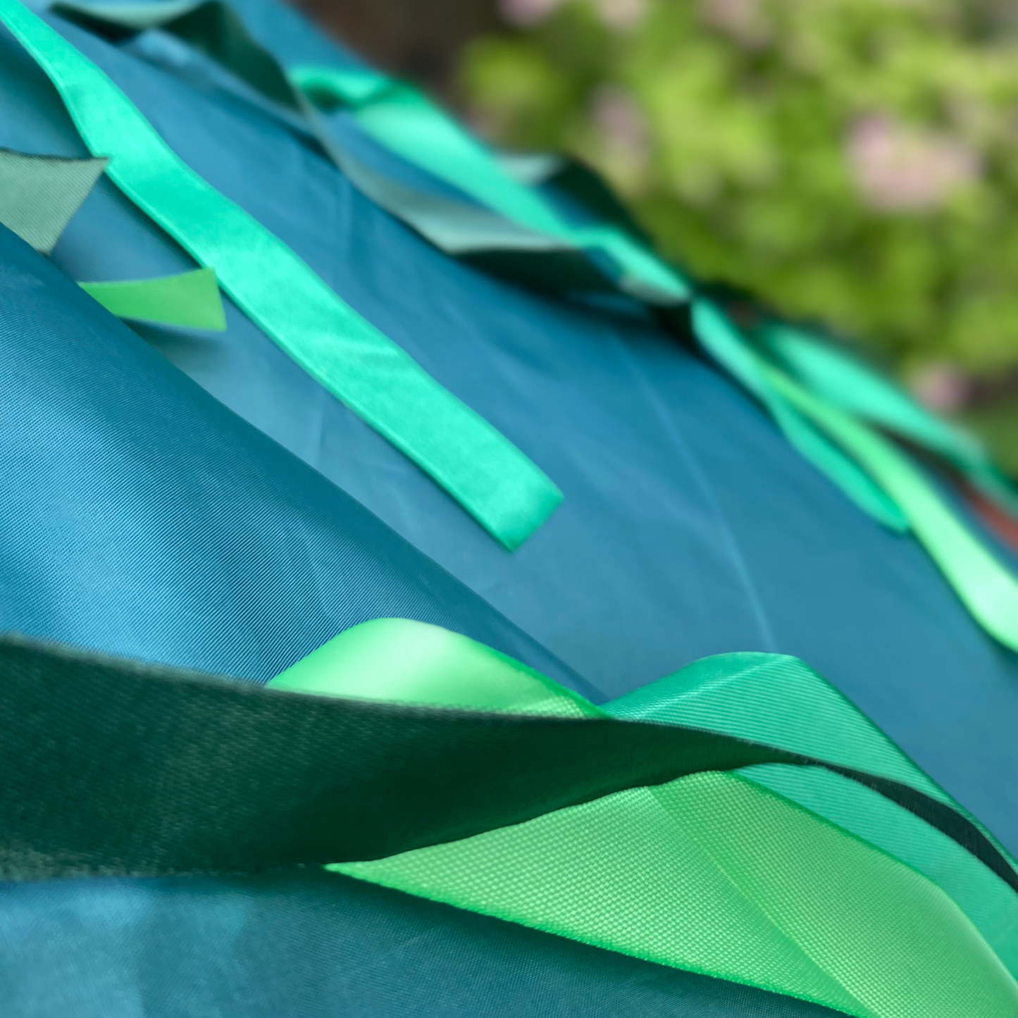 Green Jungle Sensory Parachute with ribbons moving in a breeze