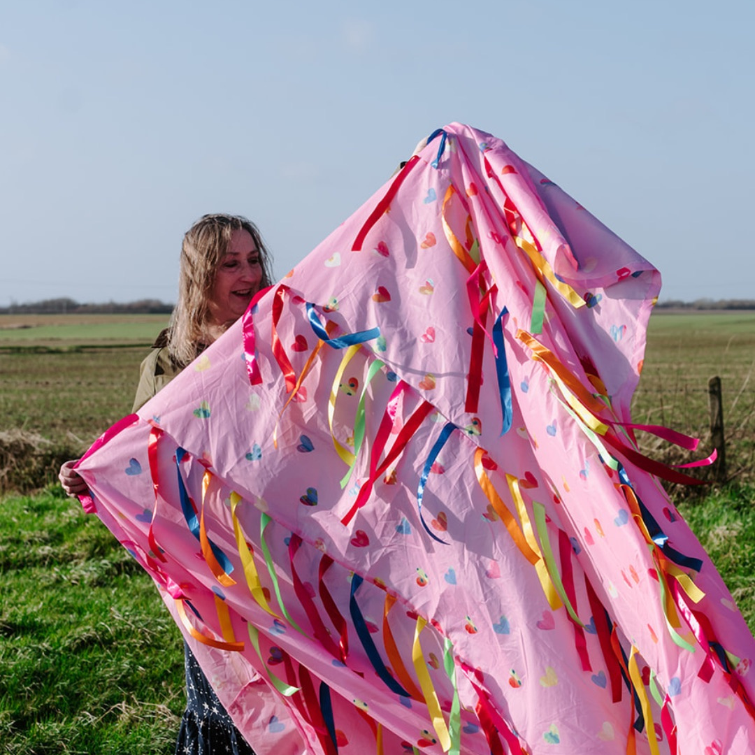Love/Pink Sensory Parachute – limited edition Valentine baby class prop with re, yellow, pink, green, orange, purple and blue ribbons. Sensory parachute for baby sensory, music and development classes.