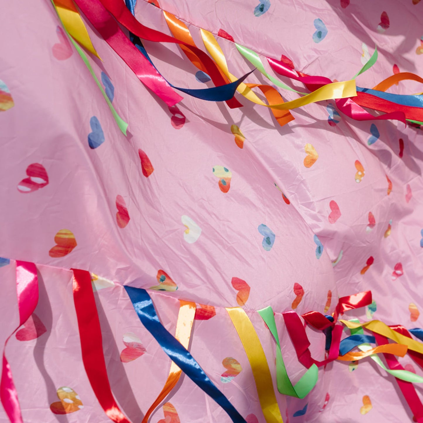 Love Valentines Sensory Parachute close up of multi colour heart pattern and ribbons