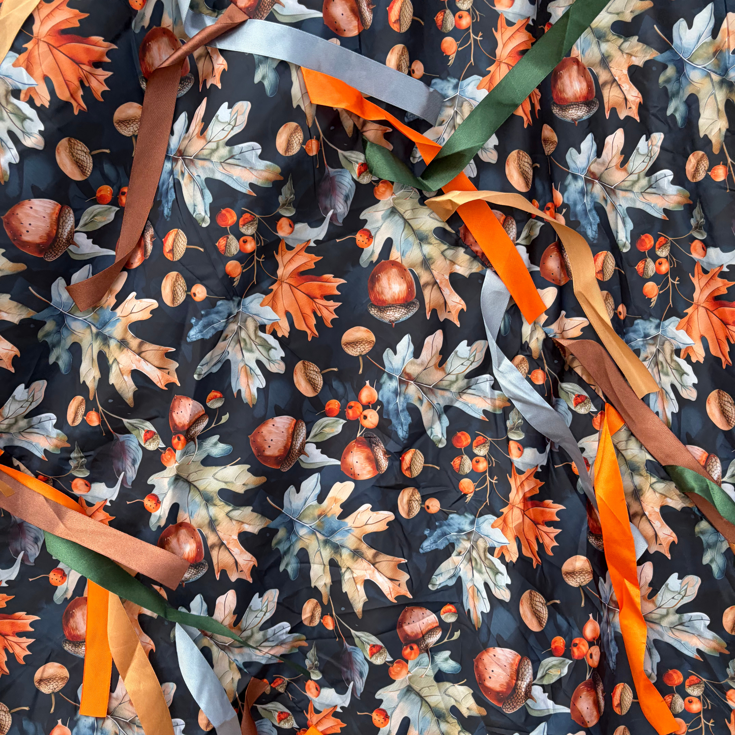 close up of the oaks and acorns sensory parachute designed for multi sensory baby classes and EYFS settings
