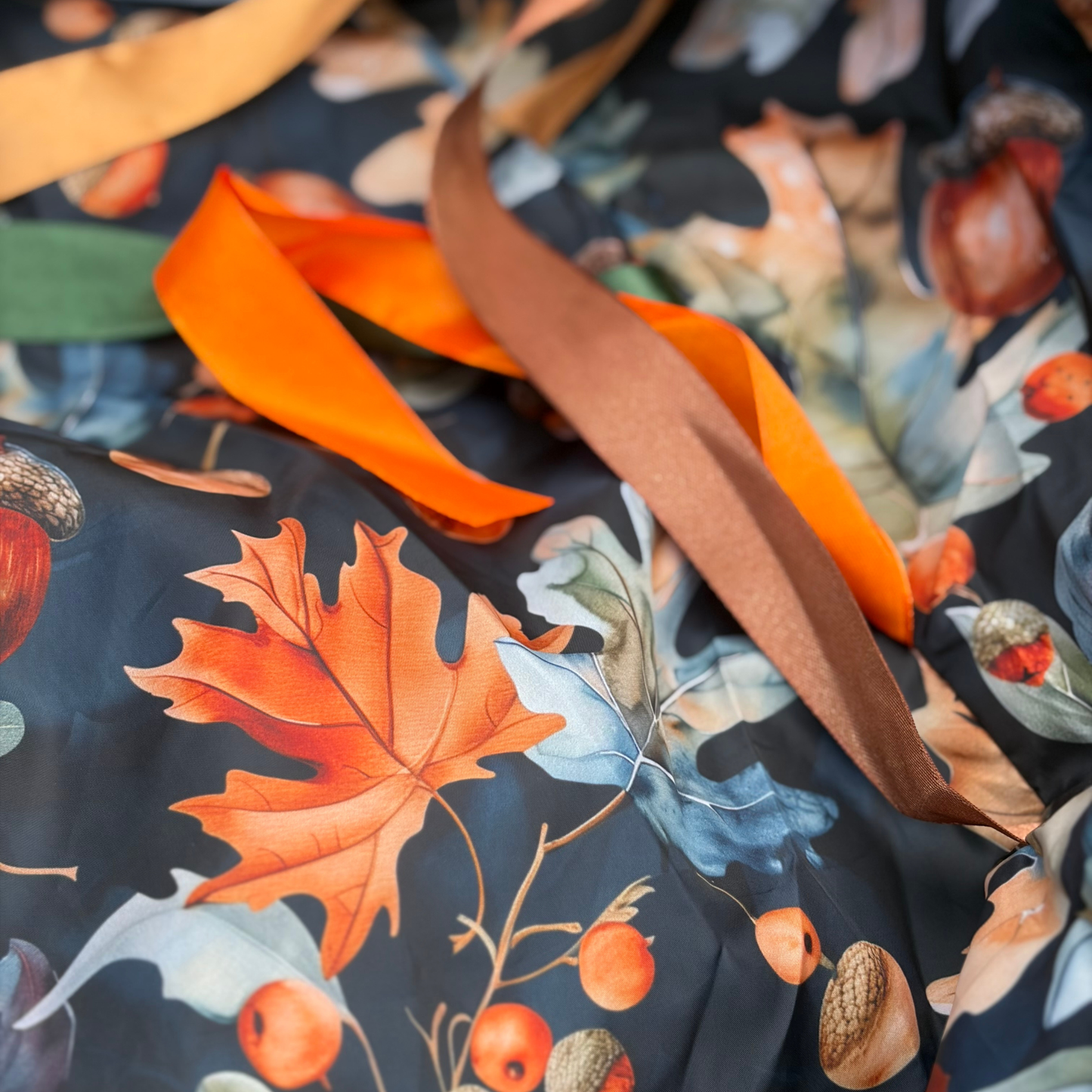 close up of the oaks and acorns sensory parachute designed for multi sensory baby classes and EYFS settings