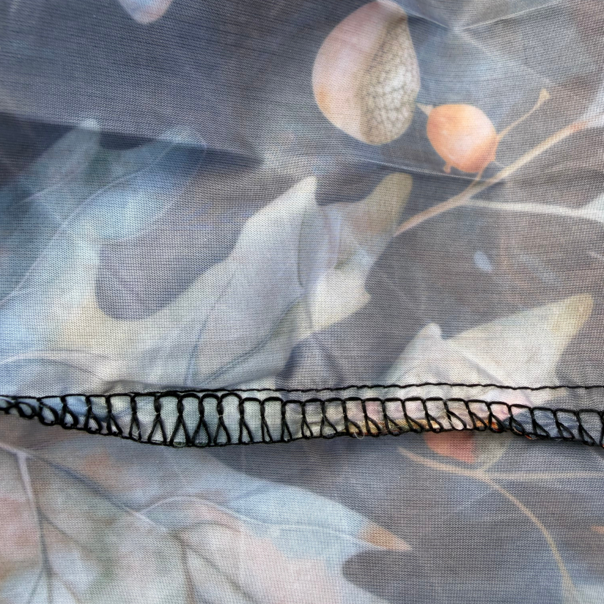 Close up of the triple stitched seams of the Oaks and Acorns Sensory Parachute designed for multi sensory baby classes